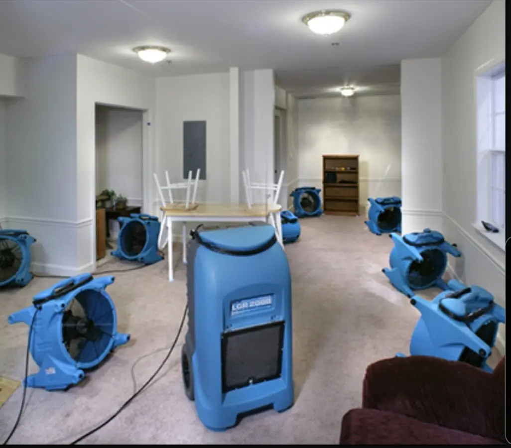 Air movers and dehumidifier setup for Water Damage Restoration in Waynesville